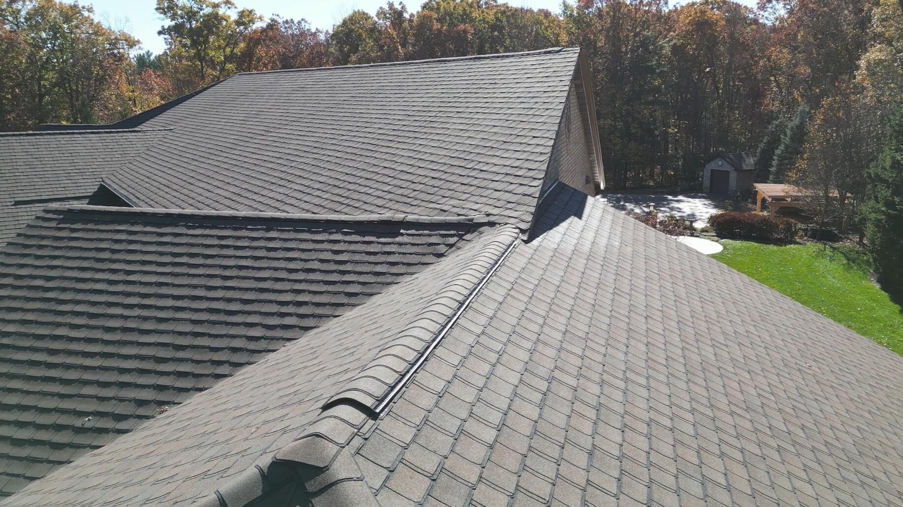 New CertainTeed Grand Manor Shingles in Brownstone with upgraded ridge vent on Eau Claire, WI home