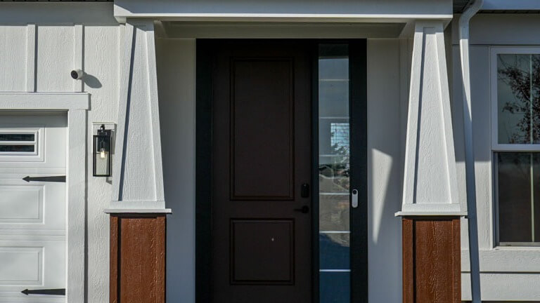 Freshly painted brown front door at Forest Lake, MN home