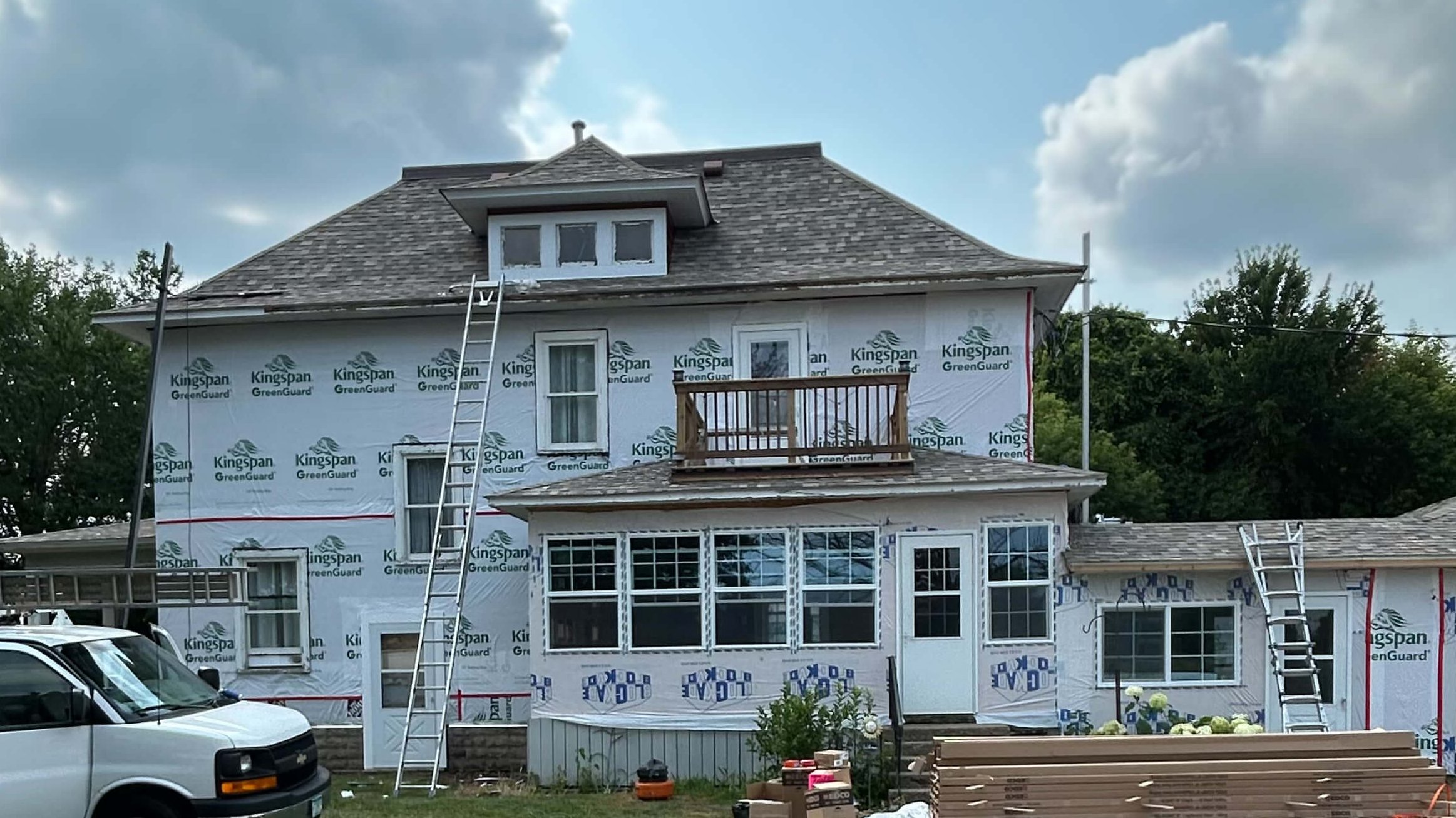 Minnesota Exterior Company removed old farmhouse siding and preparing to install new steel siding