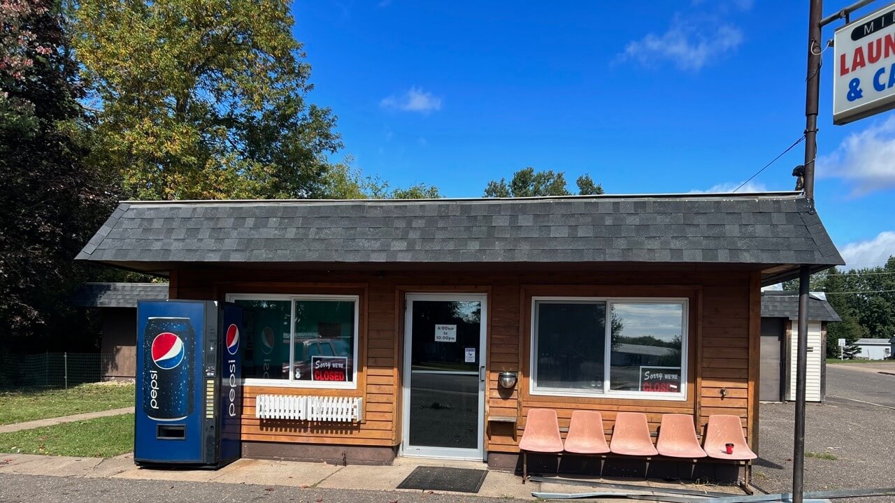 General Contractor added in new windows to Wisconsin laundromat