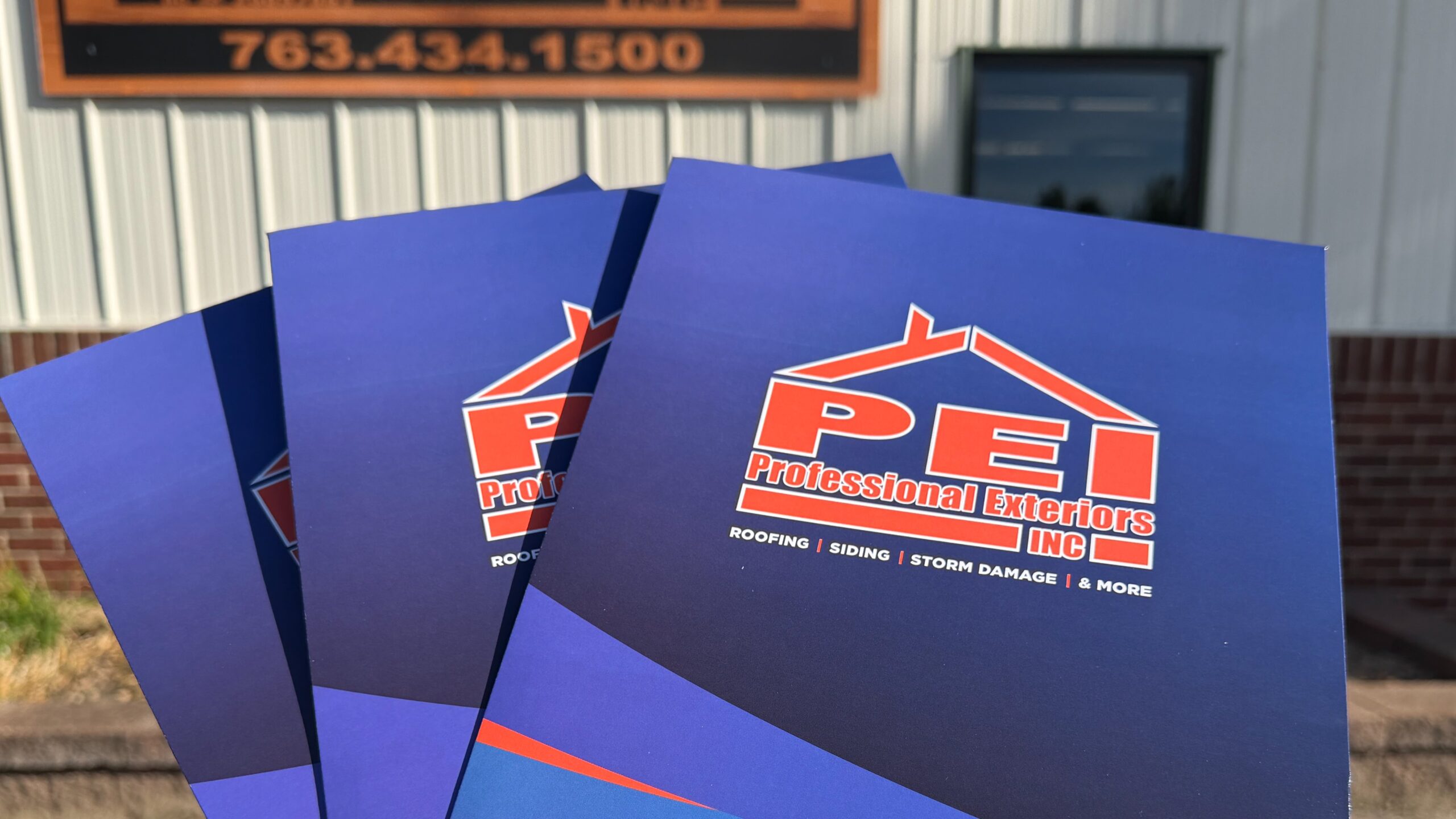 Three blue Minnesota homeowner folders		